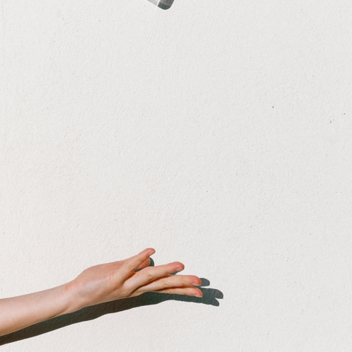 Person Throwing Hand Sanitizer